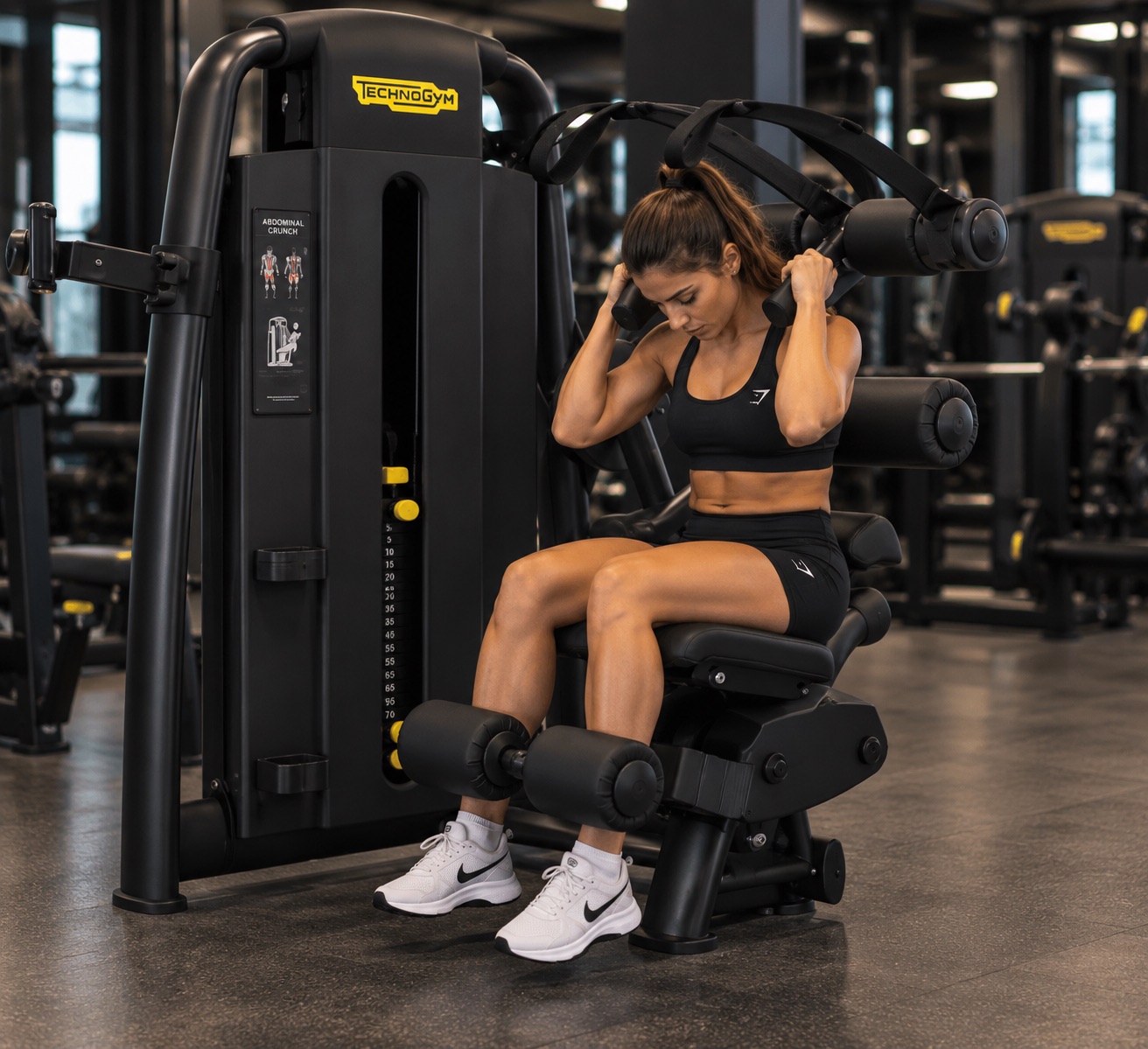Abdominales en maquina technogym